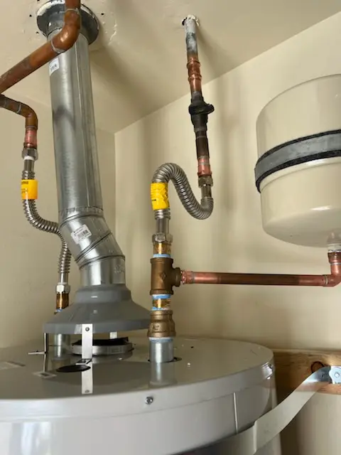 Water heater installation and plumbing repair in Alesia